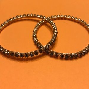 Gold band with blue gems.